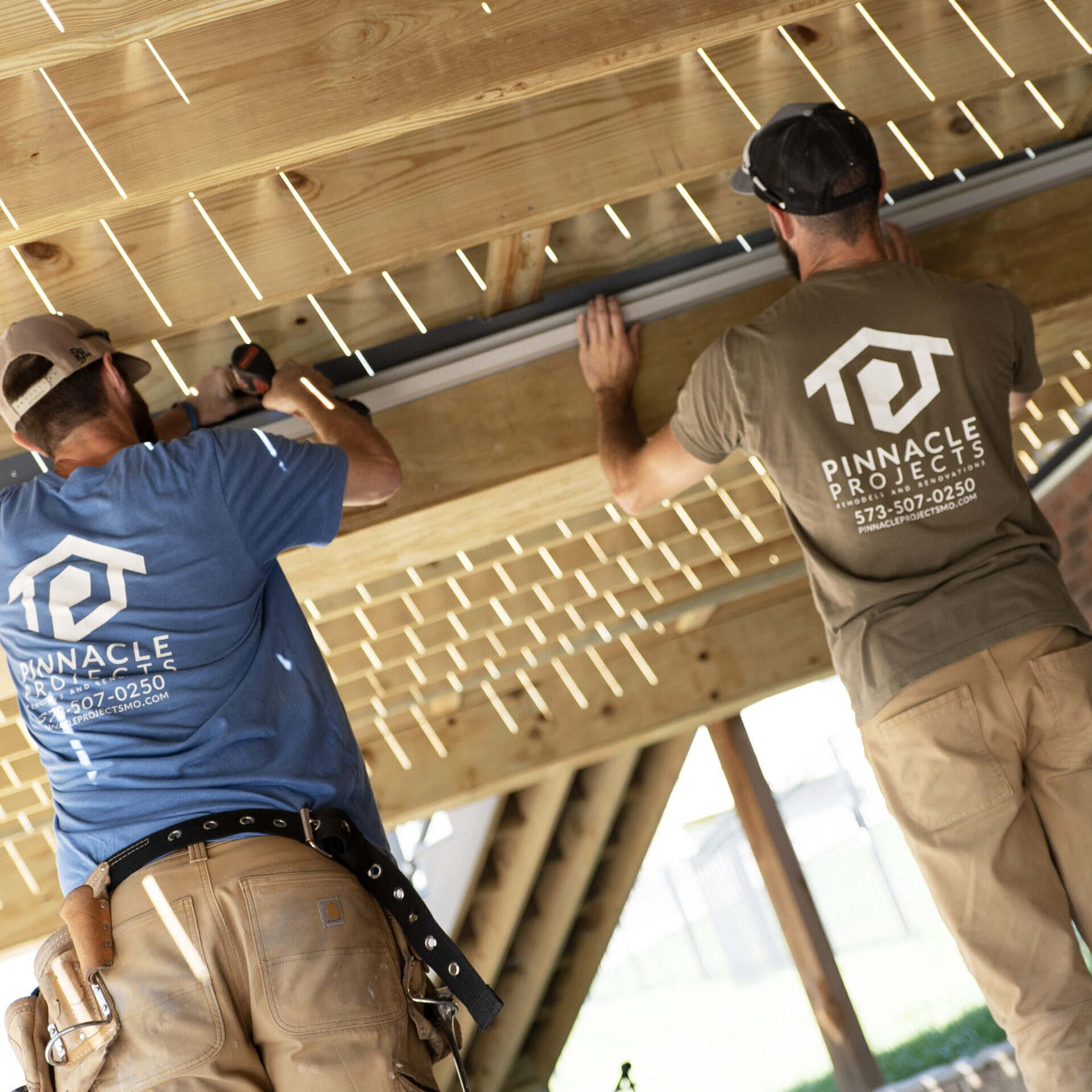 Pinnacle Projects crew installing a custom deck