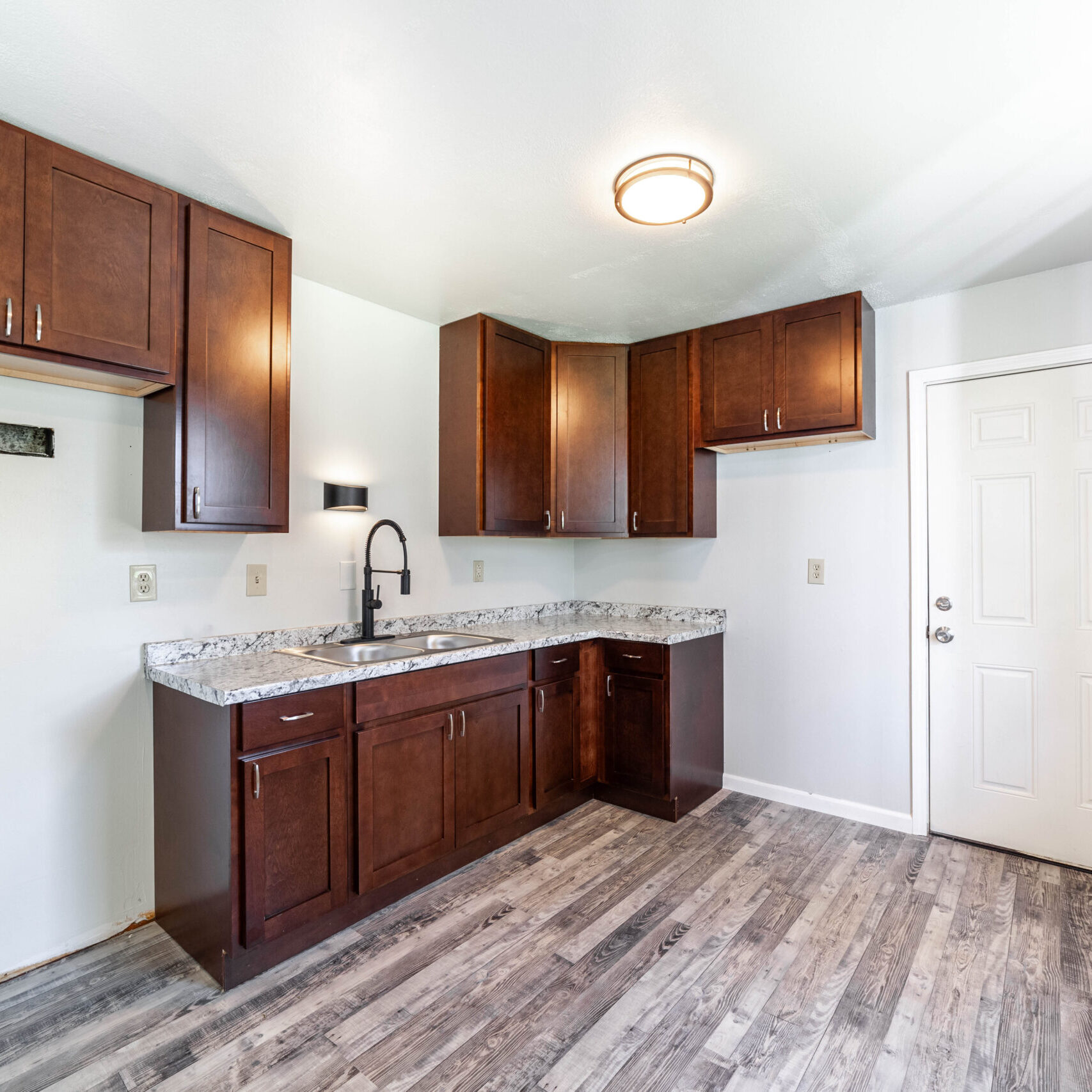 Custom white shaker cabinets in a remodeled kitchen