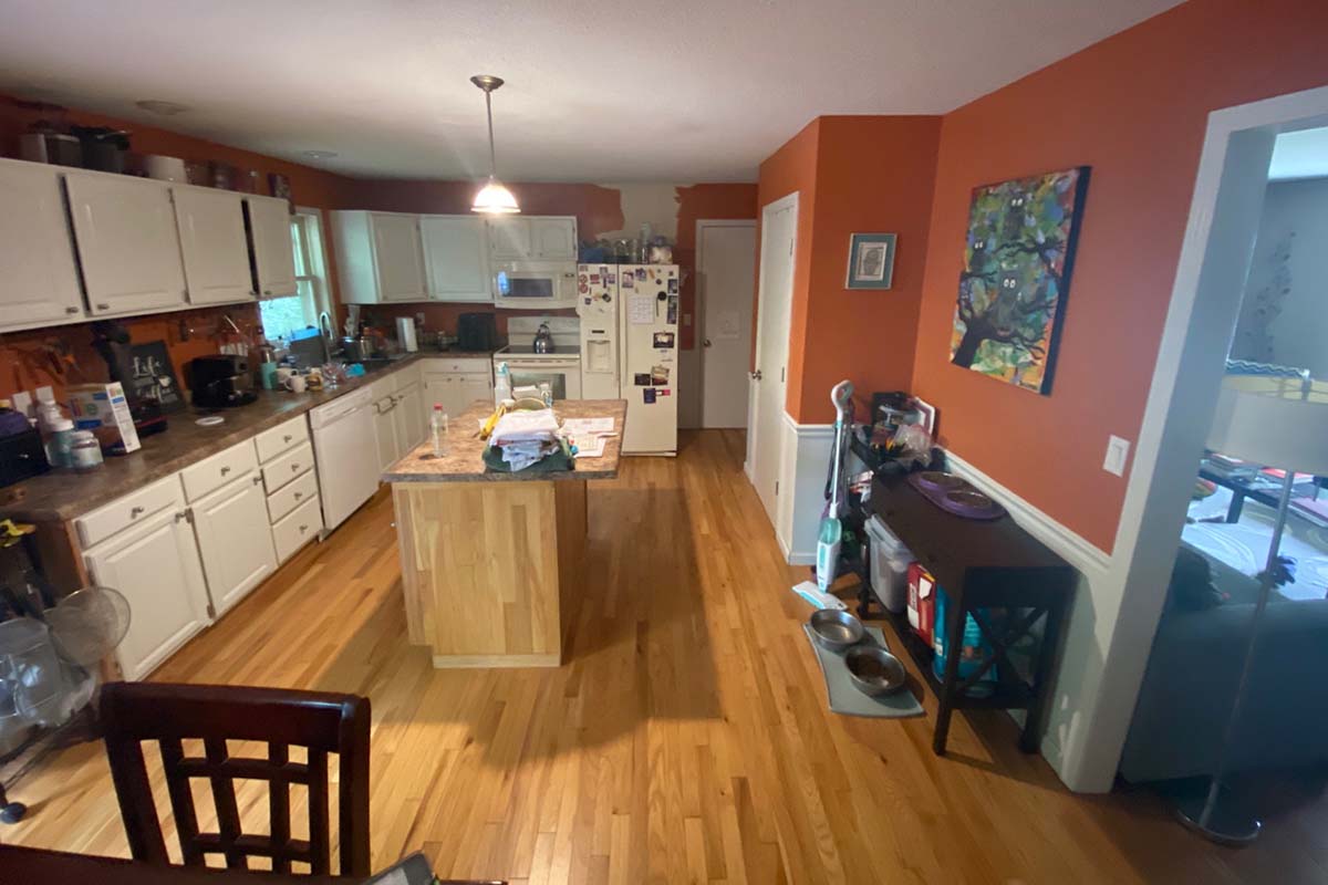 Before — Kitchen remodel with new gray cabinetry, quartz countertops, and tile backsplash